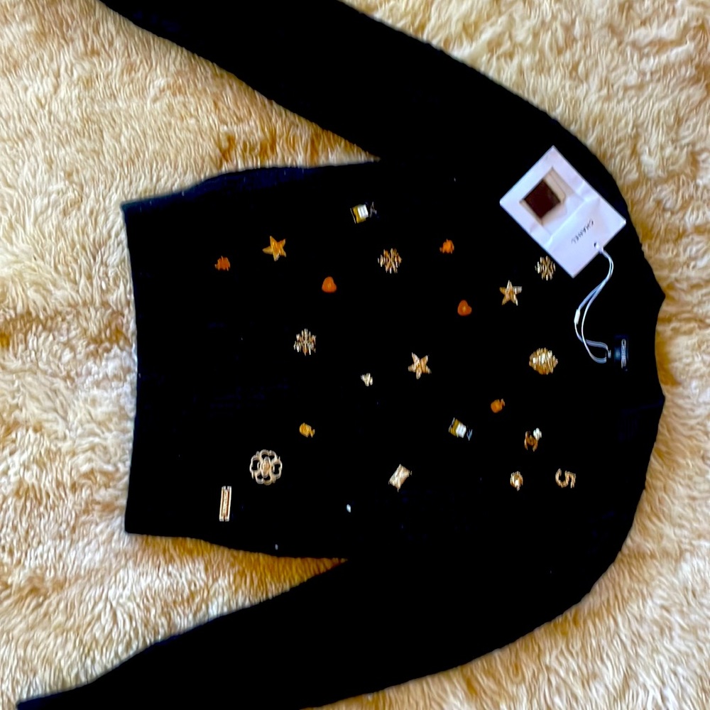 Brand new never been worn tags on Chanel sweater